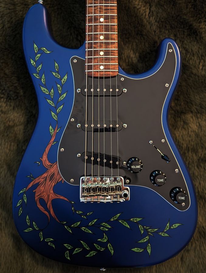 The Willowcaster electric guitar with hand-painted willow artwork